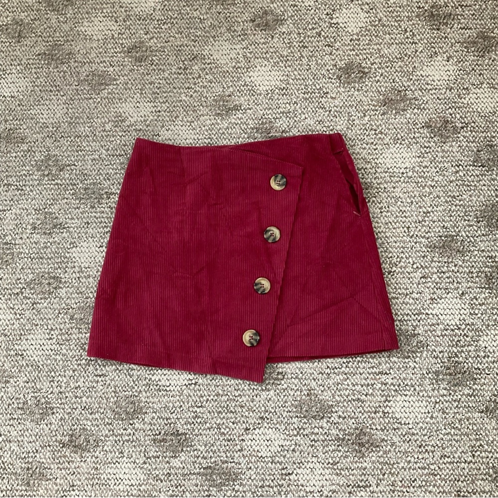 Francesca’s corduroy Mini skirt with side zipper and buttons detail